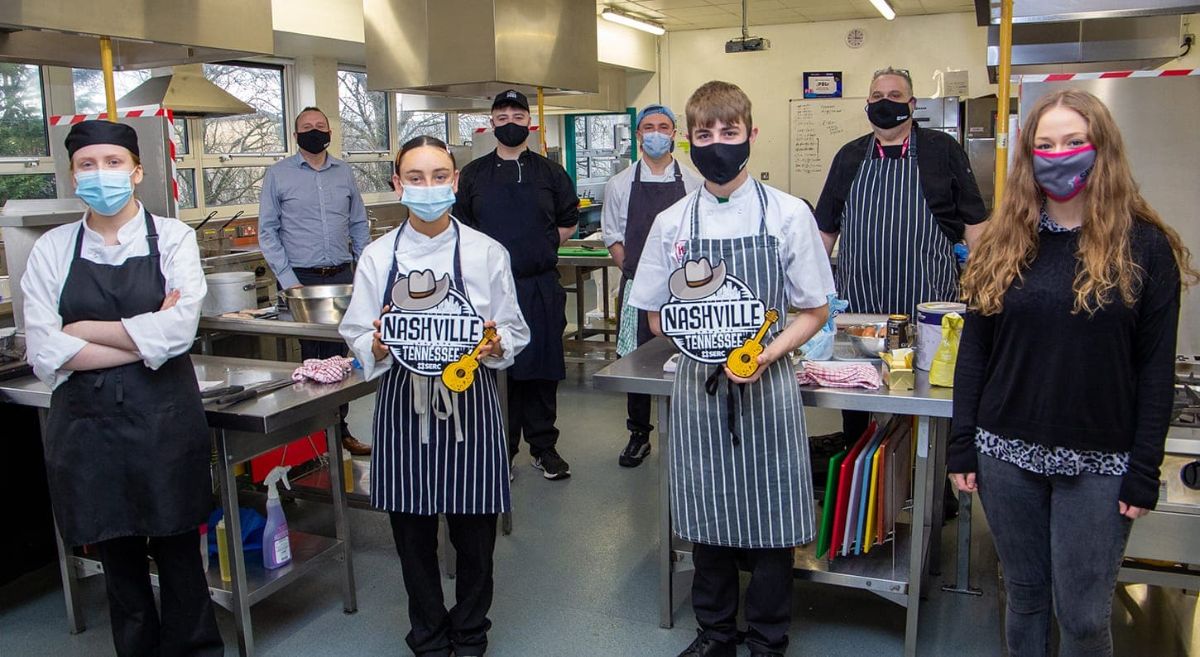 Professional Cookery students in College Kitchen with SERC staff.